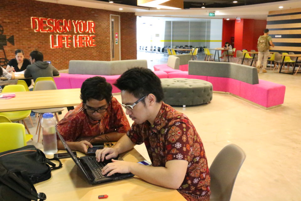 Falih and Christian on their project preparation